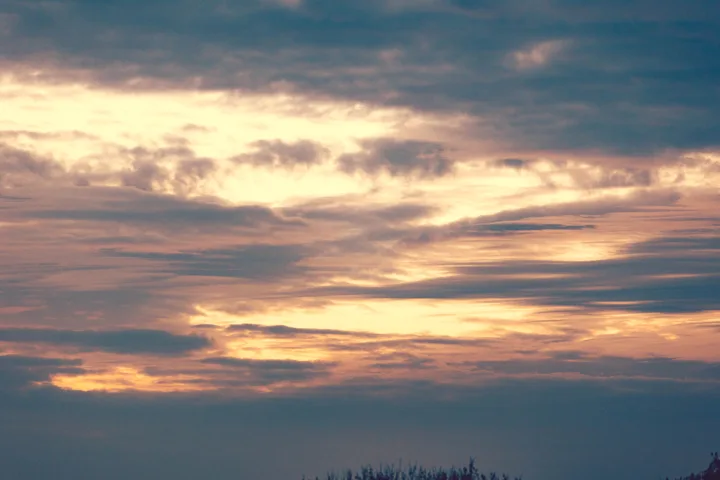 Layers of illuminated clouds — photograph by Monty Bray