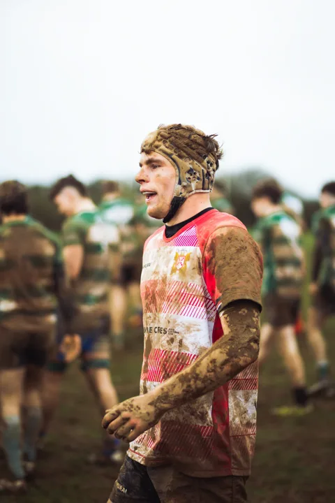 Muddy player portraits — photograph by Monty Bray