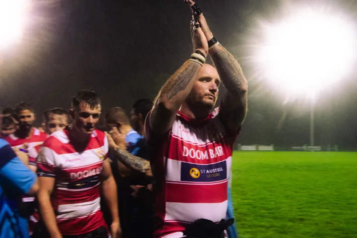 Floodlit match atmosphere — photograph by Monty Bray